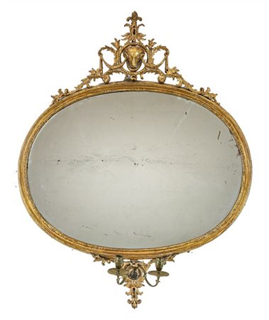 Grande ventola in legno intagliato e dorato di forma ovale con cimasa centrata