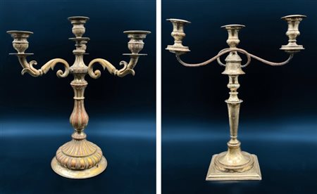 Lotto composto da due coppie di candelabri, di cui due in rame argentato a quat
