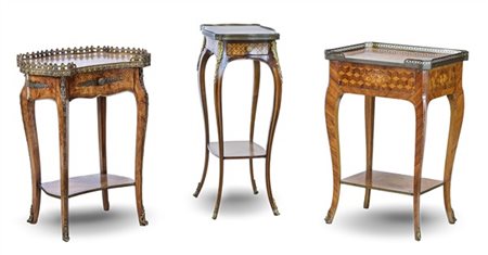 Lotto composto da tre diversi gueridon in legni vari di gusto settecentesco con