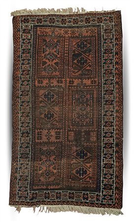 Tappeto Beluchistan, Persia, fine secolo XIX. Decoro con quattro riserve rettan