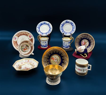 Manifatture diverse. Lotto composto da tazzine con piattini in porcellana dipin
