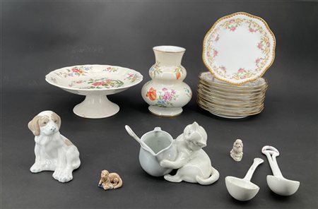 Cartone contenente diversi oggetti in ceramica policroma e porcellana per la ta