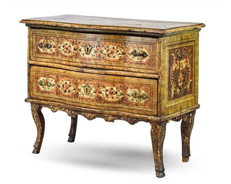 Cassettone in legno dipinto e laccato in policromia con fronte mosso a due cass