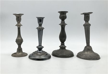 Cartone contenente numerosi candelieri e lampade ad olio in materiali diversi (