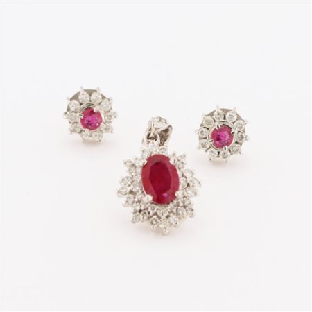 Demi-parure in platino con rubini e diamanti