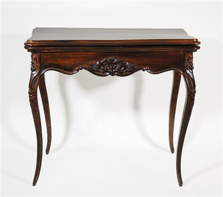 TAVOLINO DA GIOCO A LIBRO IN MOGANO seconda metà del XIX secolo fascia...