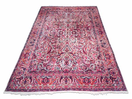 TAPPETO PERSIANO fondo avorio, campo con motivi floreali e vegetali...