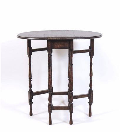 TAVOLINO A BANDELLE IN ROVERE Inghilterra, XIX secolo piano aperto ovale,...