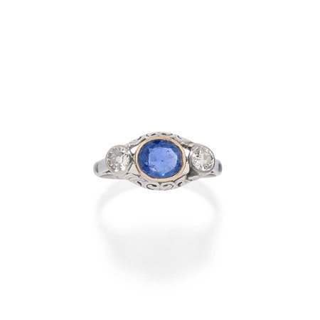 Anello con zaffiro e diamanti in oro bianco 18k