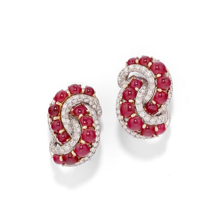 Orecchini con rubini  in oro bianco 18k