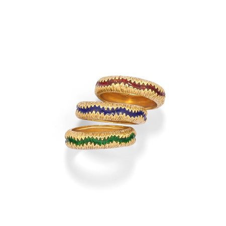 Tre anelli con smalti in oro giallo 18k