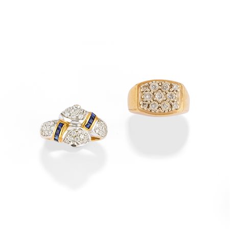 Due anelli con diamanti in oro bicolore 14k e 18k