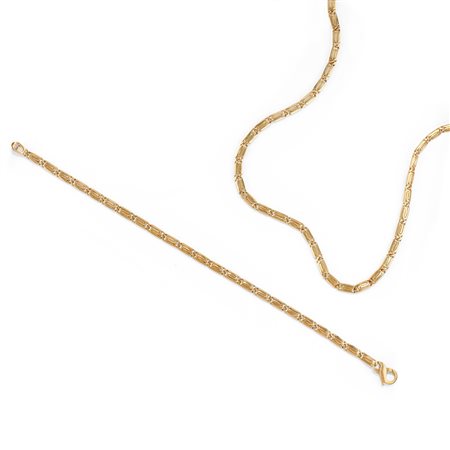 Demi parure in oro giallo 18k