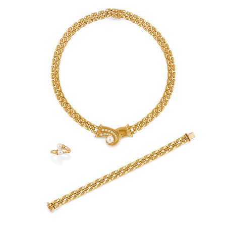 Lotto di gioielli con perle in oro giallo 18k