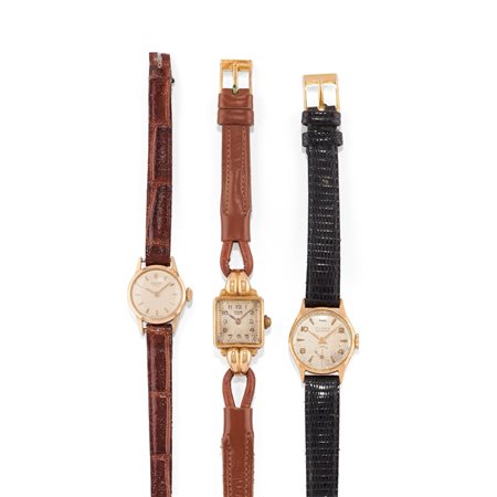 Tre orologi in oro giallo 14k e 18k