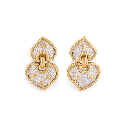 Orecchini a cuore in oro bicolore 18k