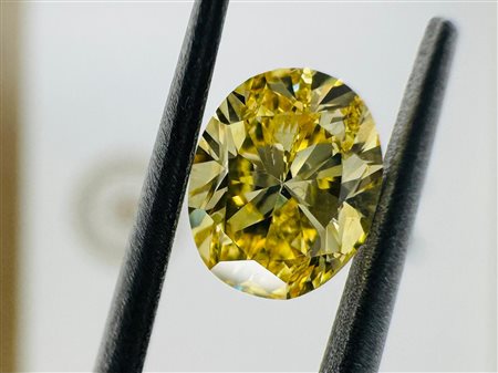 DIAMANTE NATURAL POLISHED 0,8 NATURAL FANCY GIALLO VIVIDO - CERTIFICATO GEMMOLOGICO -SI1 - GIA - BM50101