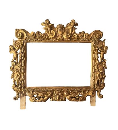 Specchiera in legno intagliata e dorata, periodo XIX secolo, le parti...