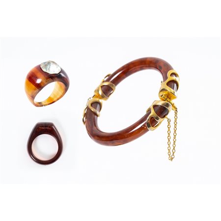 PRODUZIONE ITALIANA 1980 ca., Bracciale, anello e ferma anello