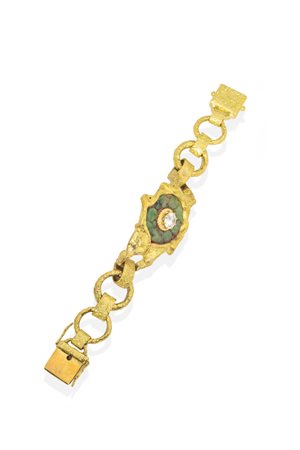 Peso gr 96,8Lunghezza cm 18Bracciale-scultura in oro giallo, firmato "...
