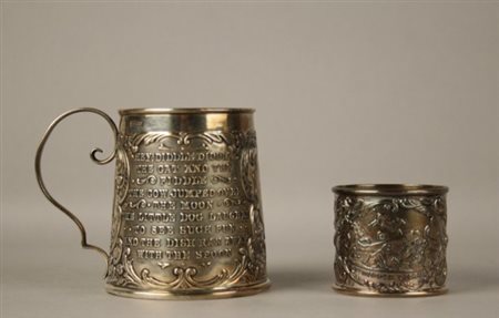 Due oggetti in argento per bambino di cui un portatovagliolo e un piccolo...