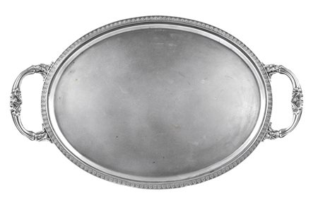 VASSOIO OVALE IN ARGENTO A DUE MANICI Italia, XX Sec. corpo liscio con...