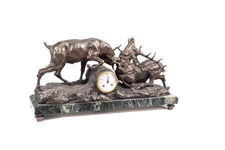 SCULTURA OROLOGIO IN BRONZO BRUNITO Francia, XIX Sec. raffigurante...