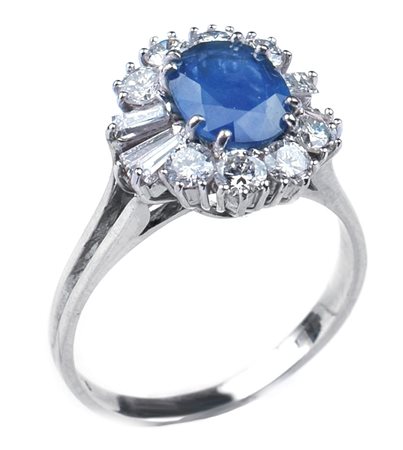 ANELLO IN ORO BIANCO 18KT CON UNO ZAFFIRO OVALE per ct 1,80 circa, circondato...