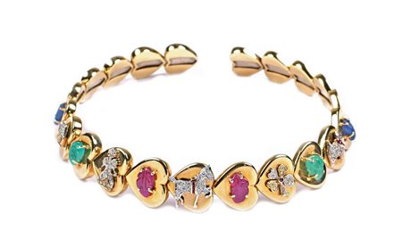 COLLIER DE CHIEN A MOTIVO DI CUORI IN ORO GIALLO 18KT con cinque charms...