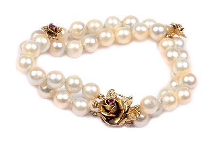 BRACCIALE A DUE FILI DI PERLE COLTIVATE DI MM. 7,5 anni 50/60 con due...