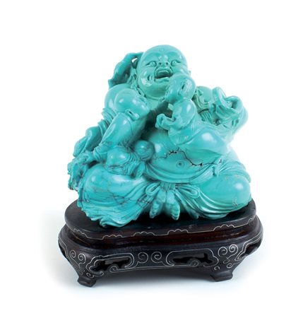 SCULTURA DI BUDDHA IN TURCHESE NATURALE Cina, XX Sec. con fanciulli,...