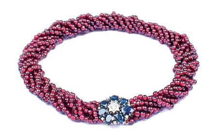 COLLANA TORCHON A SETTE FILI DI GRANATI anni 50/60 con chiusura a motivo...