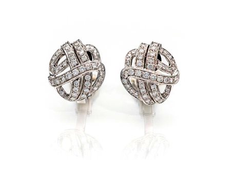 Orecchini a bottone in oro e brillanti Oro bianco 750/000. Peso complessivo...