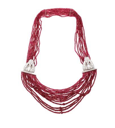 Collana in oro, rubini e brillanti Oro bianco 750/000. Rubini naturali in...