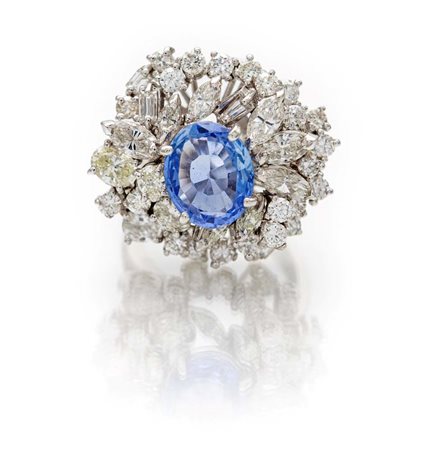 Anello a fiore in oro, brillanti e zaffiro Oro bianco 750/000. Diamanti in...