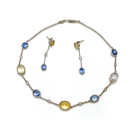 Faraone, Parure di collana e coppia di orecchini in oro, zaffiri e brillanti...