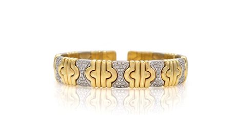 Bracciale rigido tipo Parentesi di Bulgari in oro e brillanti Oro giallo e...