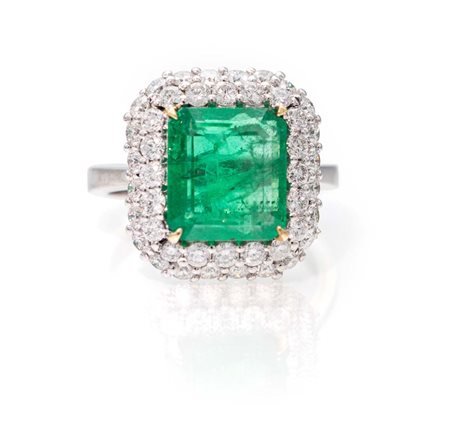 Anello in oro, brillanti e smeraldo Oro bianco 750/1000. Diamanti in taglio...