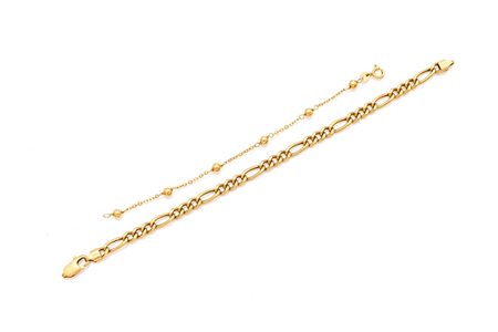 Coppia di bracciali in oro Oro giallo 750/000. Peso complessivo gr. 10,30...