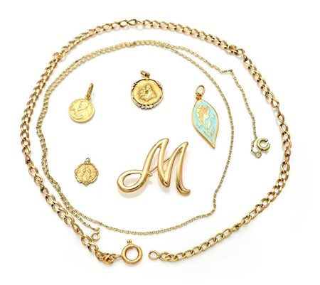 Lotto di 7 oggetti in oro Oro giallo 750/000. Peso complessivo gr. 20,40