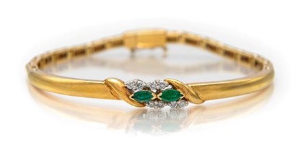 Bracciale rigido con smeraldi e brillanti Oro giallo 750/000. Peso...