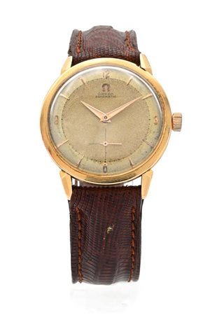 Omega automatico in oro quadrante guilloché Oro giallo 750/000. Anse...