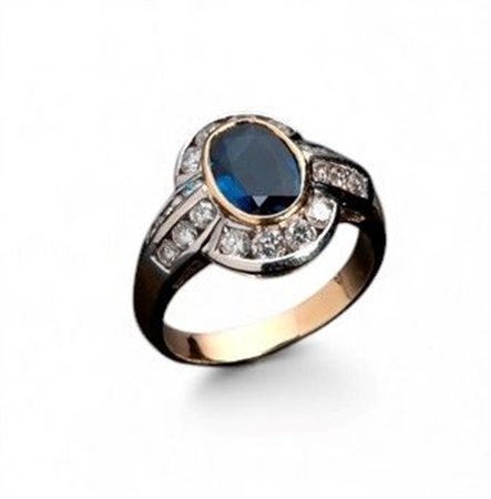  
Anello in oro con zaffiro e diamanti Anni '90
 