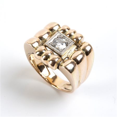  
Anello a fascia in oro e diamante     
 