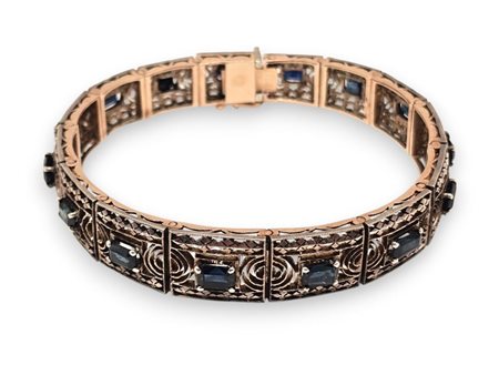  
Bracciale a nastro in oro ed argento con zaffiri Anni '50
 