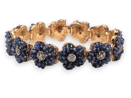  
Bracciale in oro con motivi a fiore in zaffiri e diamanti     Anni '50
 