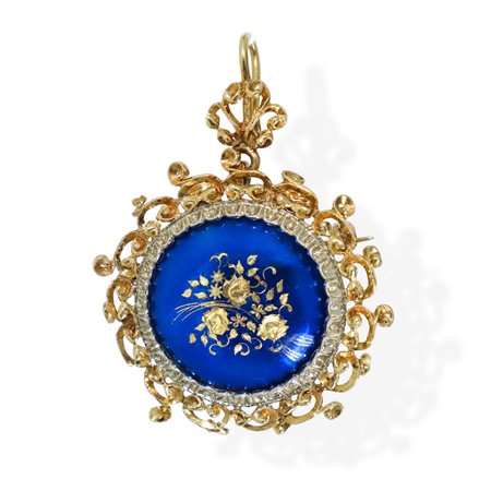 Spilla/Pendentif in oro giallo 750 con smalto blu e decoro floreale al centro