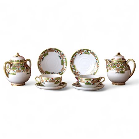 Servito da tè in porcellana policroma Giappone, XX secolo composto da 11...