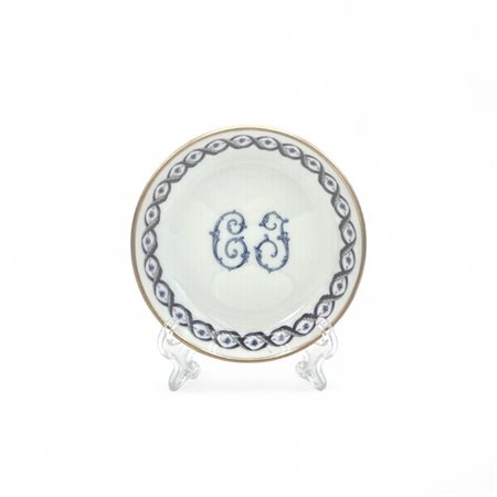 Piattino in porcellana, Ginori dipinto a motivi floreali, con iniziali...