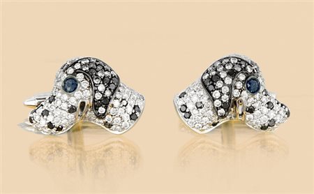 POLSINI COPPIA DI POLSINI. In oro bianco 18 kt realizzati a cagnolini...